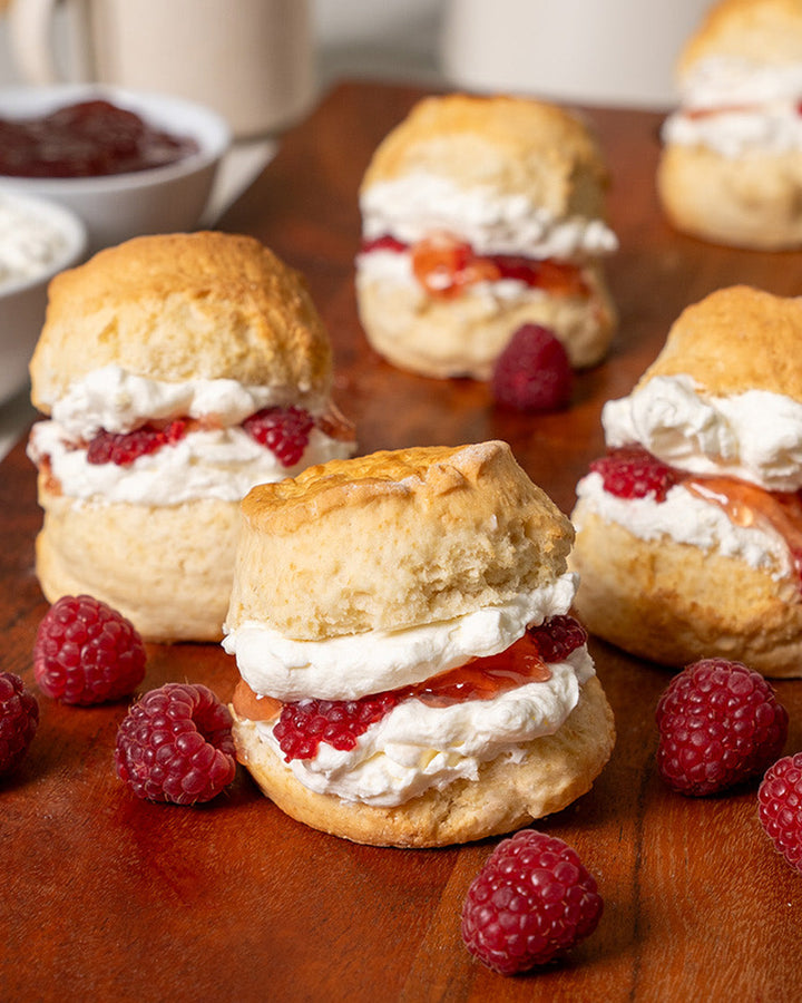 Scones for morning tea. Perfect for Corporate catering and catering meetings. Scones with sweet raspberry jam and Chantilly cream. Best scones in Melbourne.