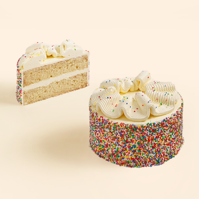 Best Sprinkle Birthday cake in Melbourne. Two layers of Vanilla cake, Vanilla buttercream and covered in 100s and 1000s.