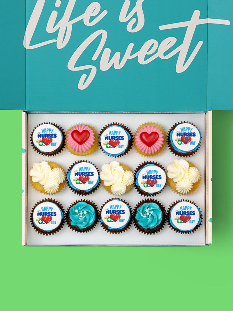 Vegan Nurse Day mini cupcakes, topped with Happy Nurse day logo and scrub coloured buttercream.