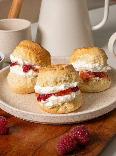 Scones for morning tea. Perfect for Corporate catering and catering meetings. Scones with sweet raspberry jam and Chantilly cream. Best scones in Melbourne.